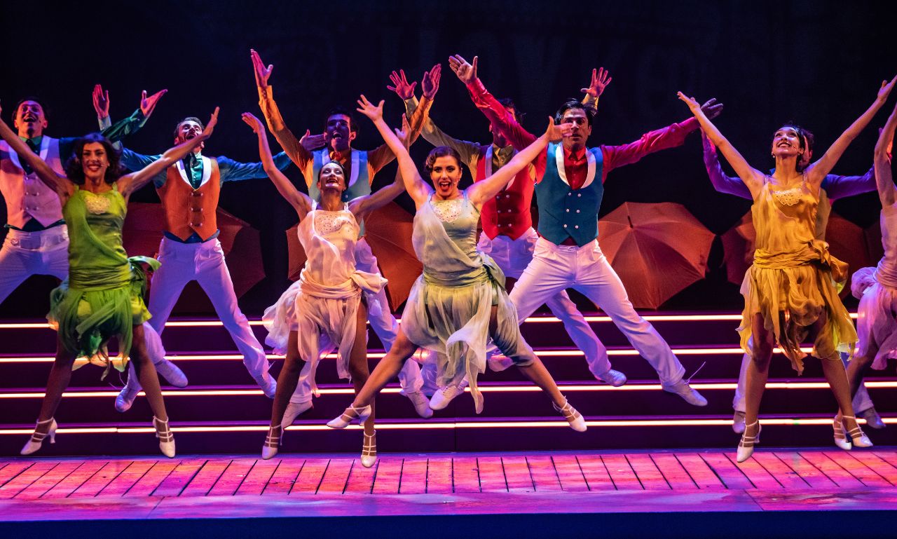 Cantando sotto la pioggia